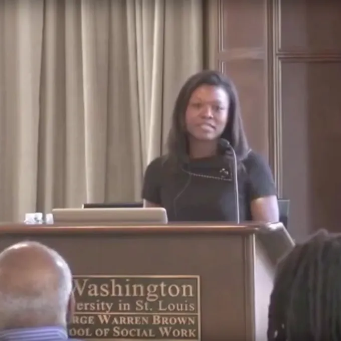 Koritha Mitchell at podium