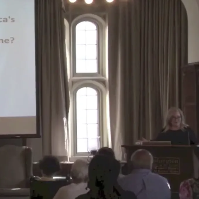 Heather Ann Thompson at podium