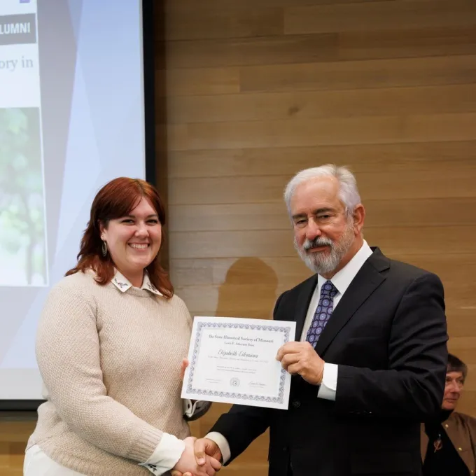 Elizabeth Eikmann receiving the Lewis E. Atherton Prize from the State Historical Society of Missouri