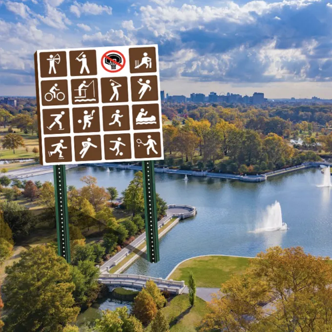 Overhead picture looking down at the Central basin of Forest Park in St. Louis.  A brown sign listing park activities has basketball crossed out.